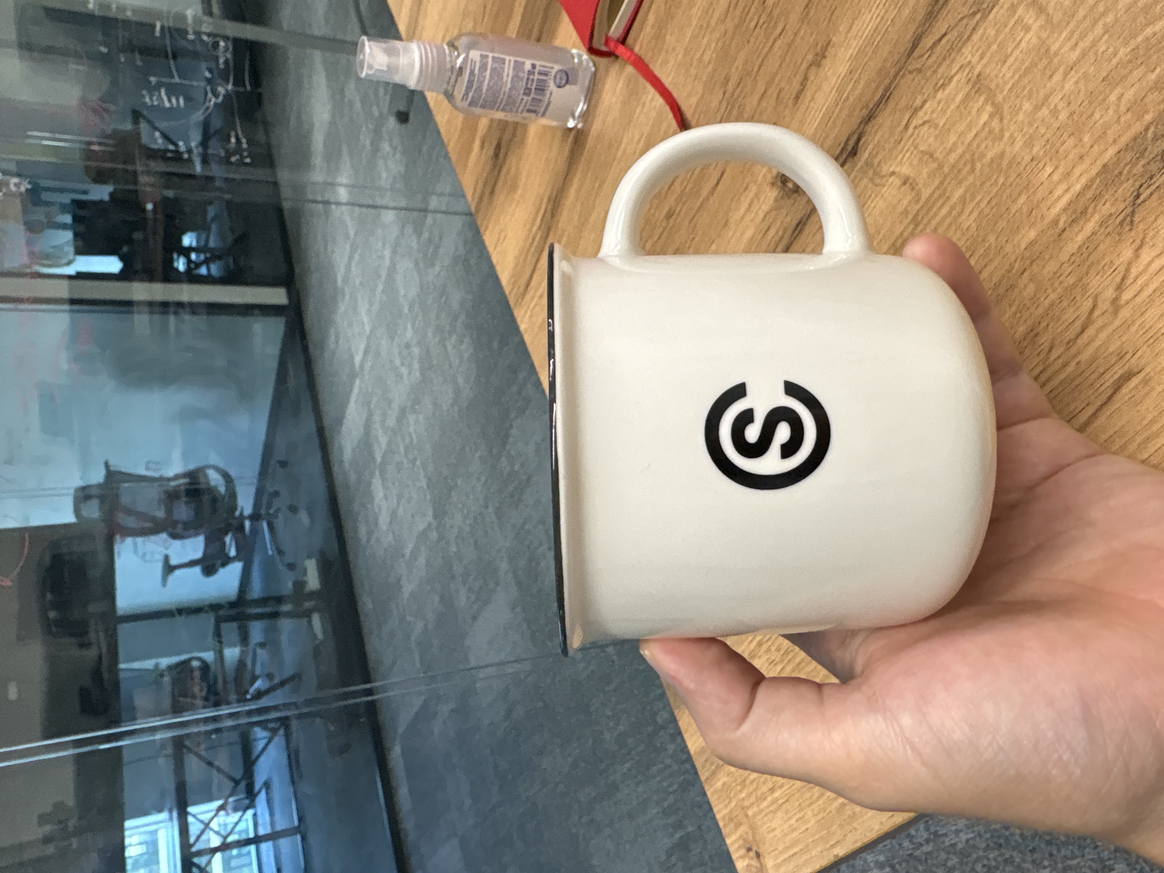 White Ceramic Mug with 'S' Logo