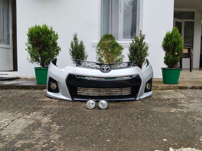 Бампер передний для Toyota Corolla 2014 г.в. серии "Спорт" с решеткой радиатора